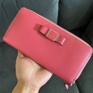Coach long zip around wallet with bow tie in pink. Brand New!